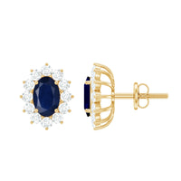 Rosec Jewels classic blue sapphire stud earrings with diamond halo, showcasing elegant gemstone and sparkling surrounding diamonds.