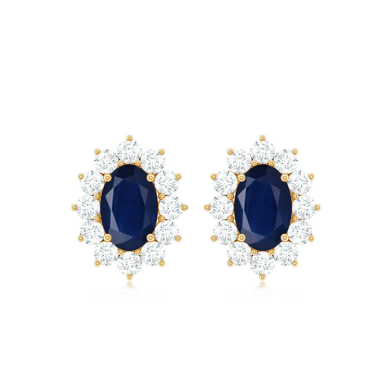 Blue sapphire stud earrings with diamond halo, featuring elegant Rosec Jewels craftsmanship and classic jewelry design.