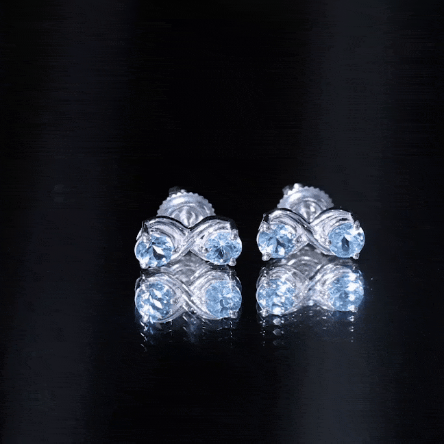 Rosec Jewels real aquamarine infinity stud earrings featuring yellow gemstone accents, showcasing elegant jewelry design.