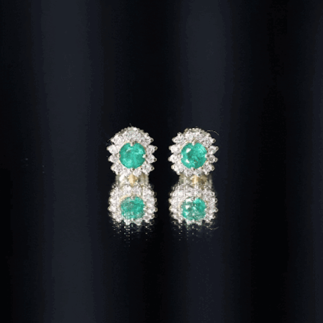 Yellow gold classic emerald stud earrings with diamond halo by Rosec Jewels, featuring vibrant green emeralds and sparkling diamonds.