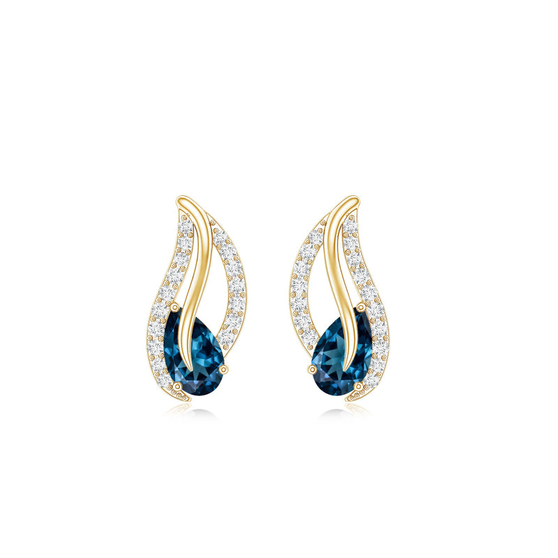 Pear-shaped London Blue Topaz and diamond leaf stud earrings by Rosec Jewels featuring elegant gemstone and diamond details.