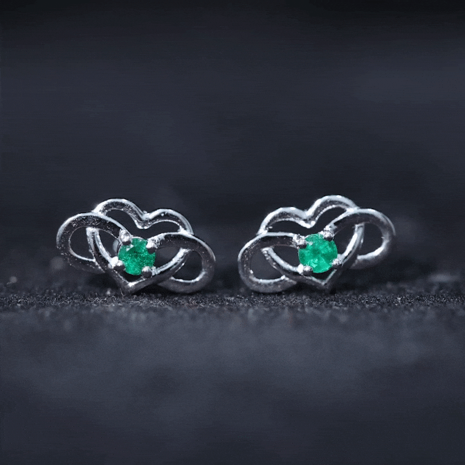 Yellow lab-grown emerald infinity heart stud earrings by Rosec Jewels, featuring sparkling green gemstones and delicate heart design.
