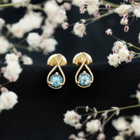 Genuine 0.5 Carat Aquamarine Infinity Stud Earrings