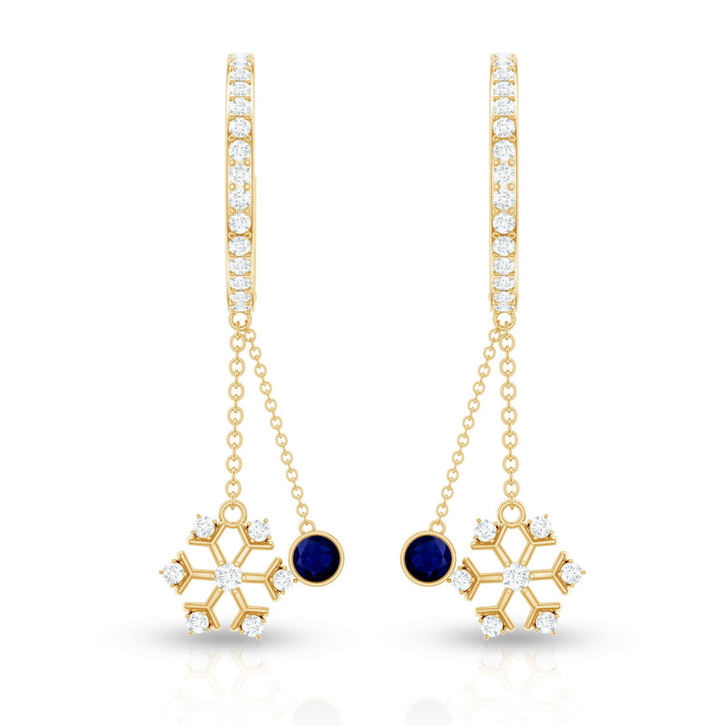 Real blue sapphire and diamond snowflake dangle hoop earrings from Rosec Jewels featuring intricate snowflake design with sparkling gemstones.