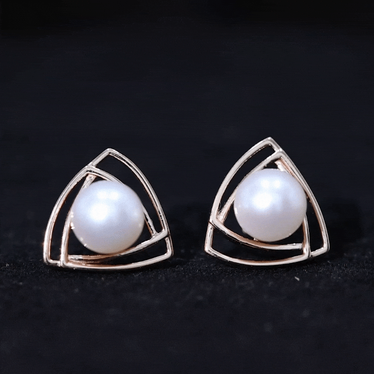 Round freshwater pearl statement stud earrings by Rosec Jewels featuring yellow accents and elegant design.