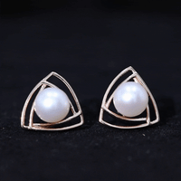 Round freshwater pearl statement stud earrings by Rosec Jewels featuring yellow accents and elegant design.