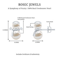 Freshwater pearl snowman stud earrings by Rosec Jewels featuring white pearl snowmen with silver accents.