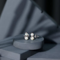 Natural freshwater pearl snowman stud earrings by Rosec Jewels, featuring elegant white pearl snowman design on silver studs.