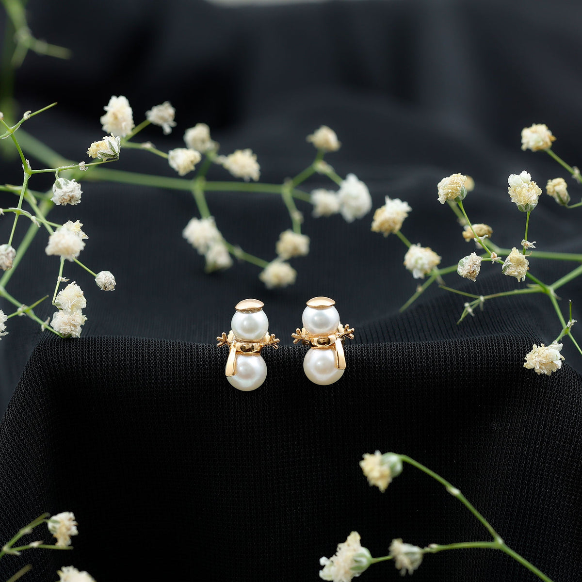 Natural freshwater pearl snowman stud earrings by Rosec Jewels featuring delicate pearl and silver snowman design.