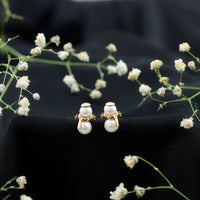 Natural freshwater pearl snowman stud earrings by Rosec Jewels featuring delicate pearl and silver snowman design.