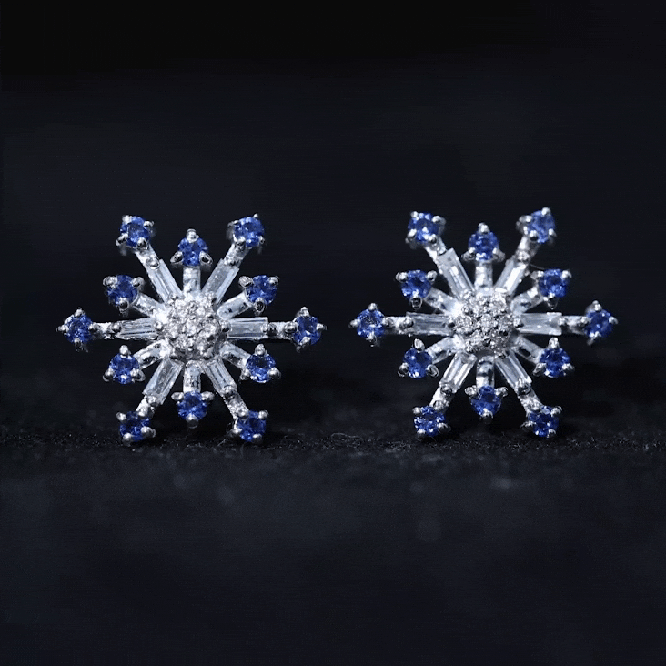 Lab grown blue sapphire and diamond snowflake stud earrings by Rosec Jewels featuring a celestial design with sparkling stones.