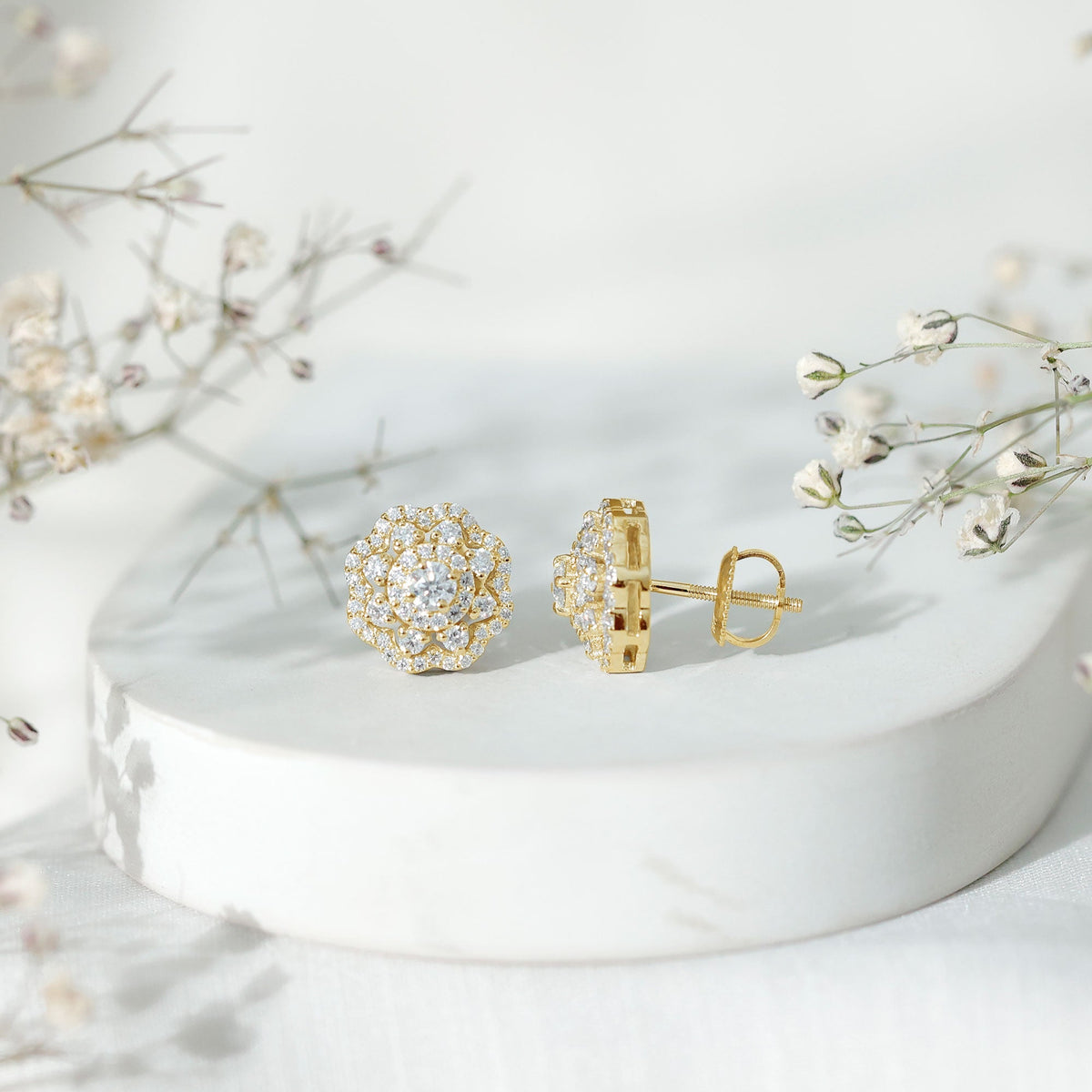 Rosec Jewels certified moissanite big flower stud earrings featuring sparkling flower-shaped design and silver-tone finish.