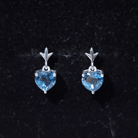 Yellow gold London Blue Topaz heart drop earrings for women by Rosec Jewels, featuring sparkling 4-carat gemstone drops.