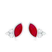 Marquise cut ruby stud earrings with diamond trio accents by Rosec Jewels, showcasing elegant gemstone jewelry.