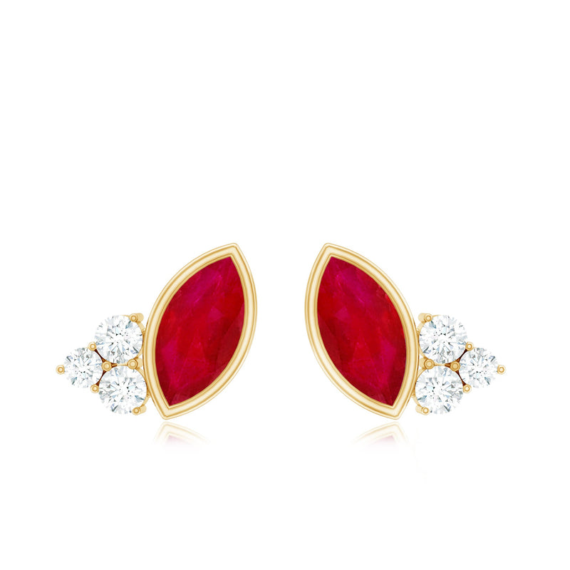 Marquise cut ruby stud earrings with diamond trio accents by Rosec Jewels, showcasing elegant gemstone jewelry design.