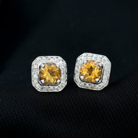 Vintage-inspired 1 carat citrine and diamond halo stud earrings by Rosec Jewels featuring gold settings and intricate design.