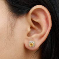 Vintage-inspired 1-carat citrine and diamond halo stud earrings by Rosec Jewels featuring gold-tone settings and intricate detailing.