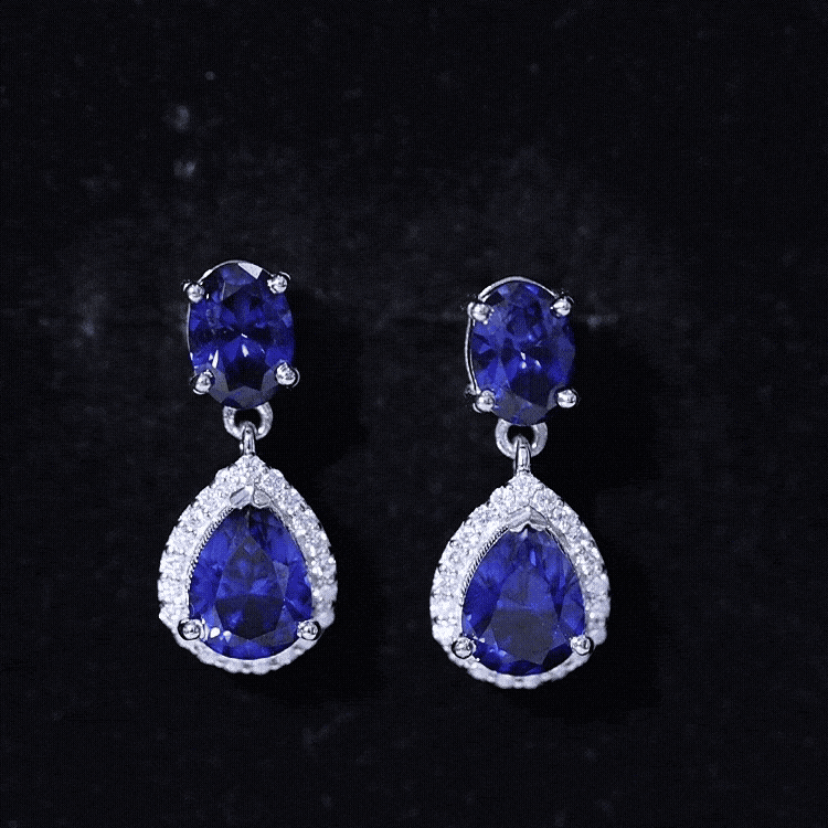 Rosec Jewels 5 Carat Lab Grown Blue Sapphire Teardrop Earrings with certificate, featuring sparkling blue sapphires and elegant design.