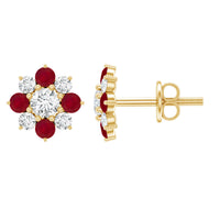 Real diamond and ruby floral stud earrings by Rosec Jewels featuring sparkling diamonds and vibrant rubies in a floral design.