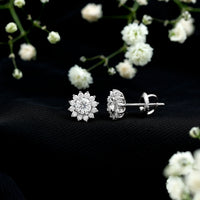Round cut moissanite halo stud earrings for women by Rosec Jewels, featuring sparkling gemstone detail and elegant gold setting.