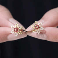 Natural ruby floral stud earrings with diamond stones from Rosec Jewels, showcasing intricate flower design and sparkling accents.