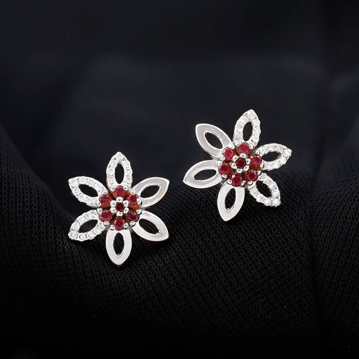 Natural ruby floral stud earrings with diamond stones, crafted by Rosec Jewels, featuring vibrant red gemstones and sparkling accents.