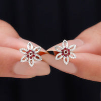 Natural ruby floral stud earrings with diamond stones from Rosec Jewels, featuring intricate floral design and sparkling gemstones.
