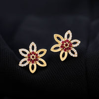 Natural ruby floral stud earrings with diamond accents from Rosec Jewels, featuring intricate flower design and sparkling gemstones.