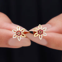 Natural ruby floral stud earrings with diamond stones from Rosec Jewels, showcasing intricate flower design and sparkling accents.