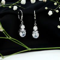Rosec Jewels cubic zirconia hoop drop earrings with lever back, featuring sparkling cubic zirconia stones and gold-tone finish.