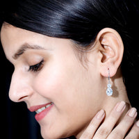 Rosec Jewels cubic zirconia hoop earrings with lever back, featuring sparkling drop design and shiny metal finish.