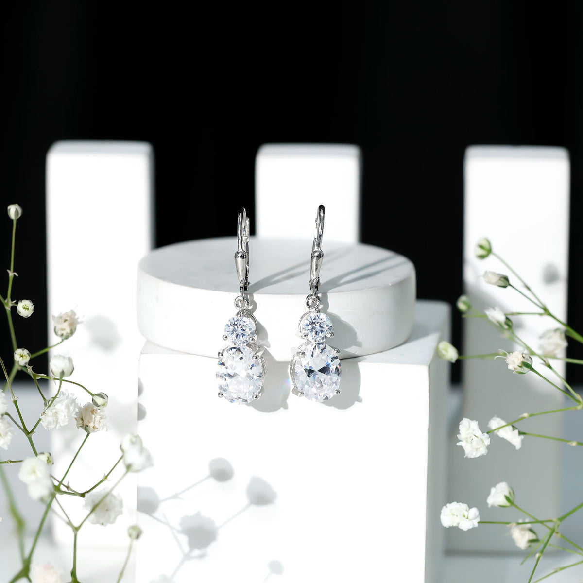 Rosec Jewels cubic zirconia hoop drop earrings with lever back, featuring sparkling stones and sleek gold-tone finish.