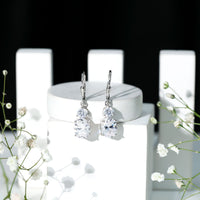 Rosec Jewels cubic zirconia hoop drop earrings with lever back, featuring sparkling stones and sleek gold-tone finish.