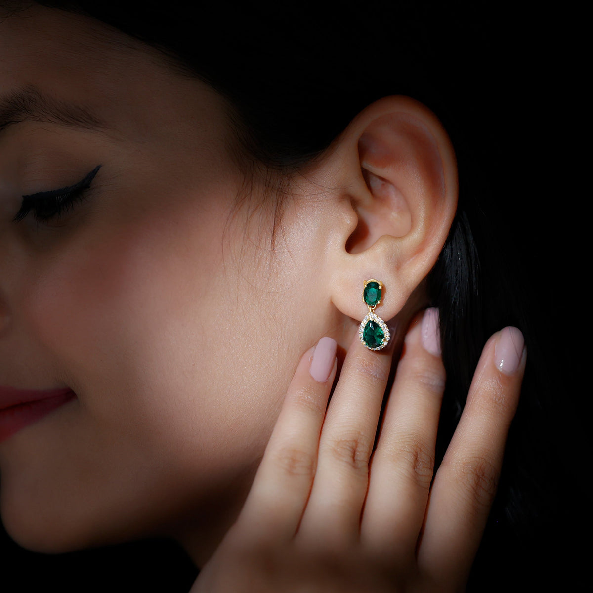 Lab created emerald dangle earrings with moissanite stones by Rosec Jewels, showcasing elegant jewelry design and sparkling accents.