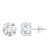 Certified 4 Carat Moissanite stud earrings in silver, featuring sparkling gemstones and a classic earring design.