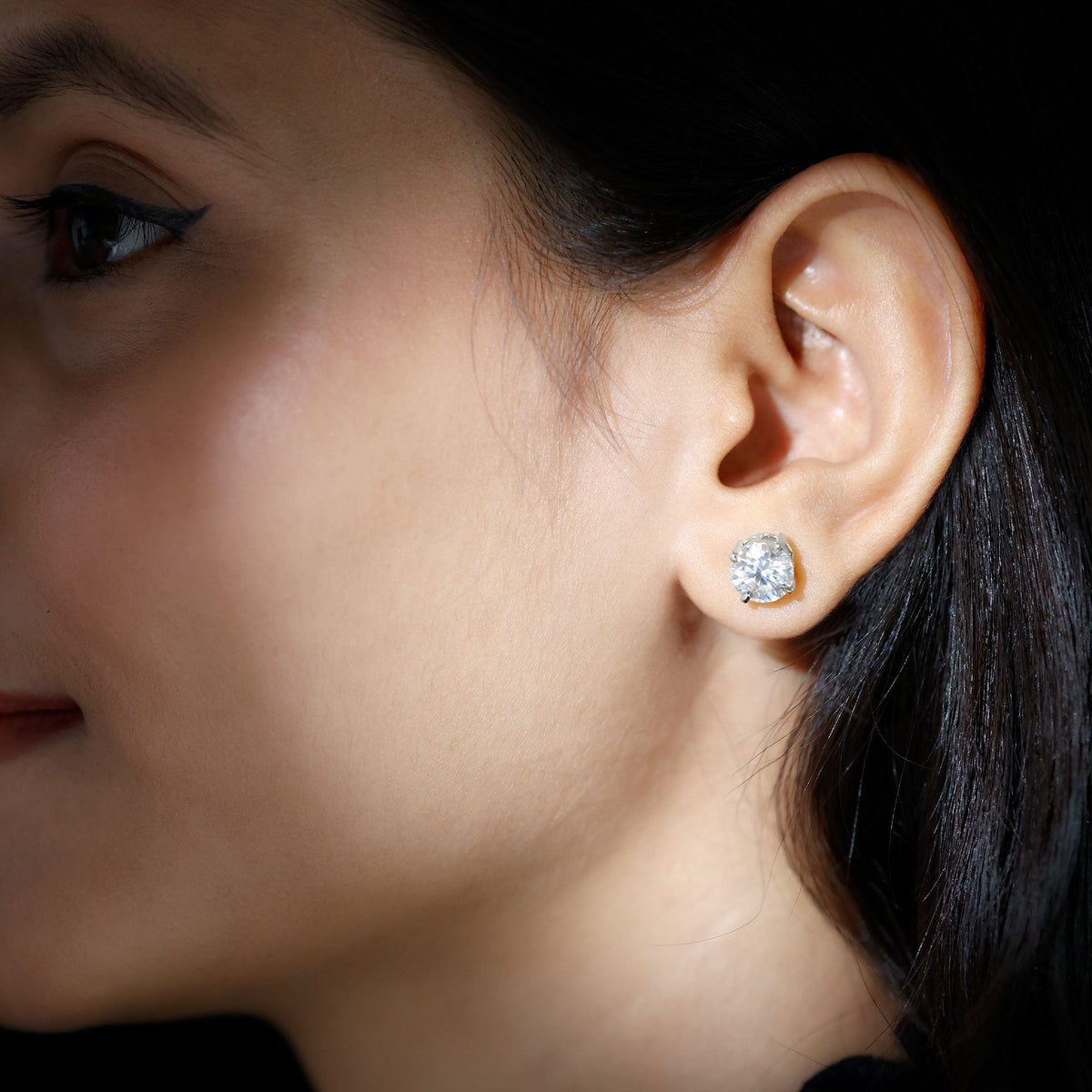 Certified 4 Carat Moissanite stud earrings in silver with round gemstones, featuring a classic and elegant design from Rosec Jewels.