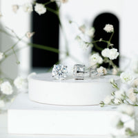 Certified 4 carat Moissanite stud earrings in silver, featuring sparkling gemstones and a classic jewelry design by Rosec Jewels