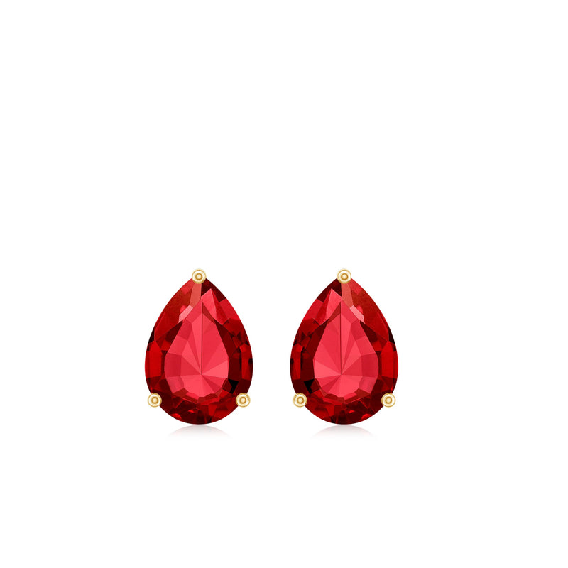 Pear-shaped lab-created ruby stud earrings in a solitaire 5x7mm setting from Rosec Jewels.
