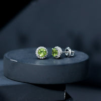 Rosec Jewels classic peridot and diamond stud earrings for women, featuring green gemstones and sparkling diamonds.