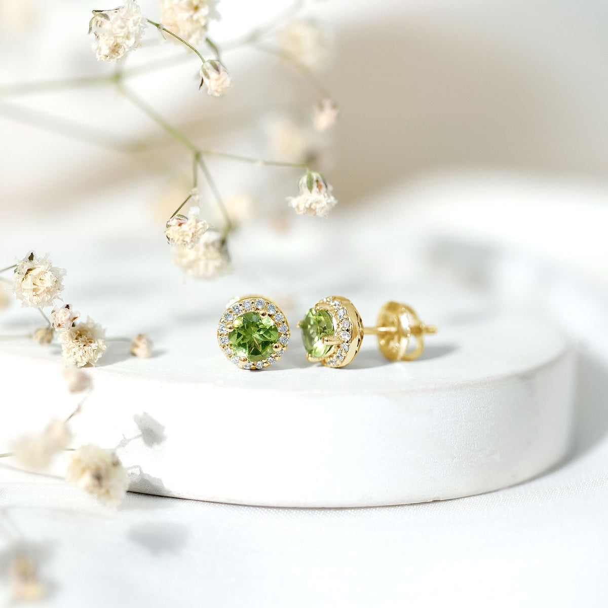 Rosec Jewels classic peridot and diamond stud earrings for women, featuring vibrant green peridots and sparkling diamonds.