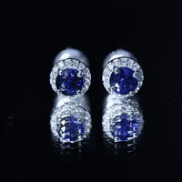 Real 1.9 carat blue sapphire and diamond halo stud earrings by Rosec Jewels featuring yellow gold settings and intricate design.