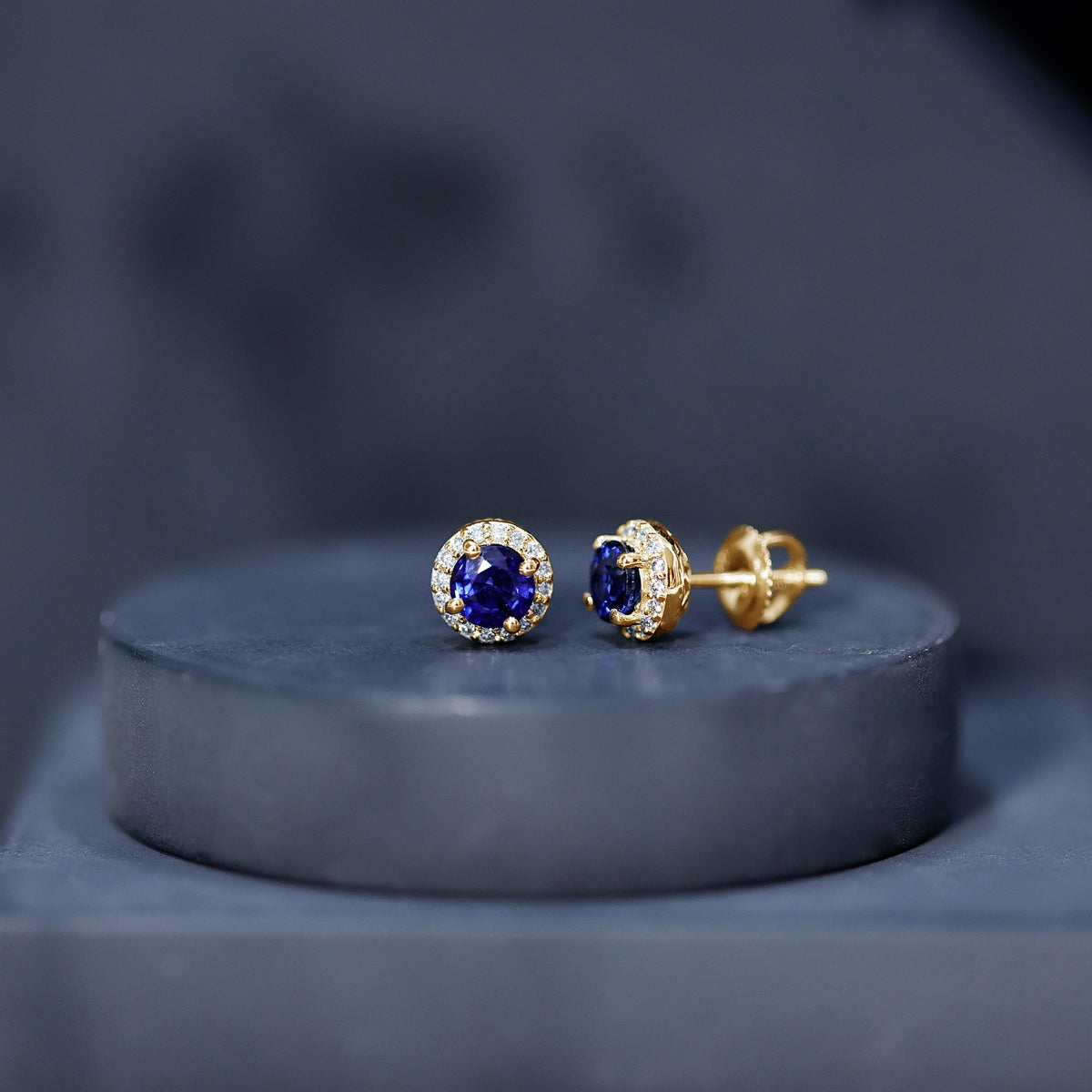 Real 1.9 carat blue sapphire and diamond halo stud earrings by Rosec Jewels featuring sparkling gemstones and elegant design.