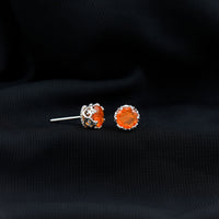 1.5 carat fire opal solitaire crown stud earrings by Rosec Jewels, showcasing vibrant orange gemstones in a regal setting.