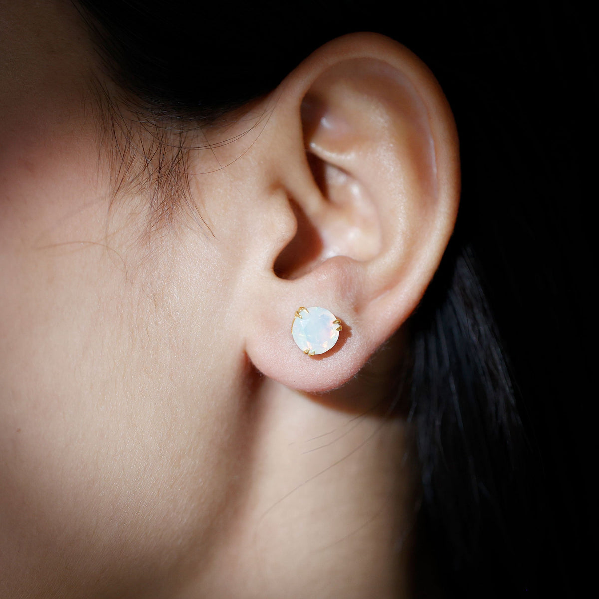 4 carat Ethiopian opal solitaire stud earrings in double prong setting by Rosec Jewels, showcasing vibrant, iridescent gemstone.