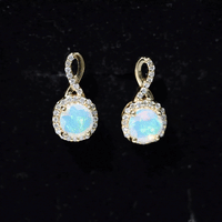 Ethiopian opal and diamond infinity stud earrings by Rosec Jewels featuring 1 carat colorful opal and sparkling diamonds