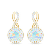 Ethiopian opal and diamond infinity stud earrings by Rosec Jewels featuring 1 carat opals and sparkling diamonds.