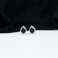 Pear cut black onyx and diamond halo stud earrings by Rosec Jewels featuring 2 carats of elegance.