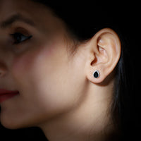 Pear-shaped black onyx and diamond halo stud earrings by Rosec Jewels, showcasing elegant black gemstone and sparkling diamond accents.