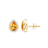 Pear-shaped citrine stud earrings with diamond halo from Rosec Jewels, showcasing sparkling yellow gemstones and elegant design.