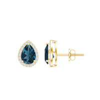 London Blue Topaz teardrop stud earrings with diamond halo by Rosec Jewels, featuring elegant blue gemstone and sparkling diamond accents.